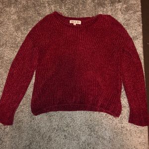Deep red sweater